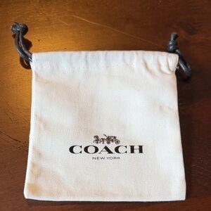 Coach White Canvas Drawstring Pouch with Black Logo